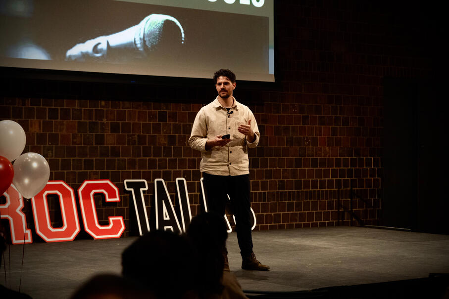 Photo of therapist and educator, Kyle Sullivan, teaching at the University of Rochester.